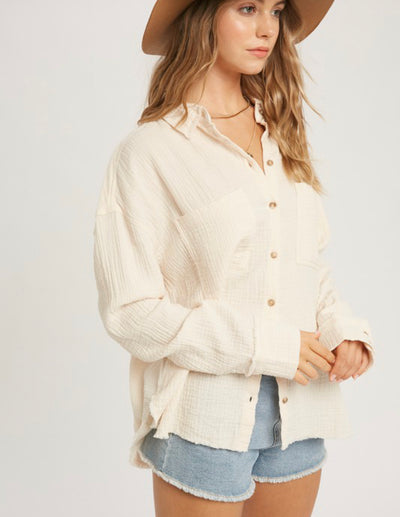 white button down shirt in gauze material with two front pockets
