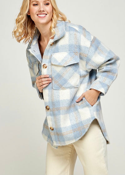 Blue and white plaid print shacked with button down front and pockets