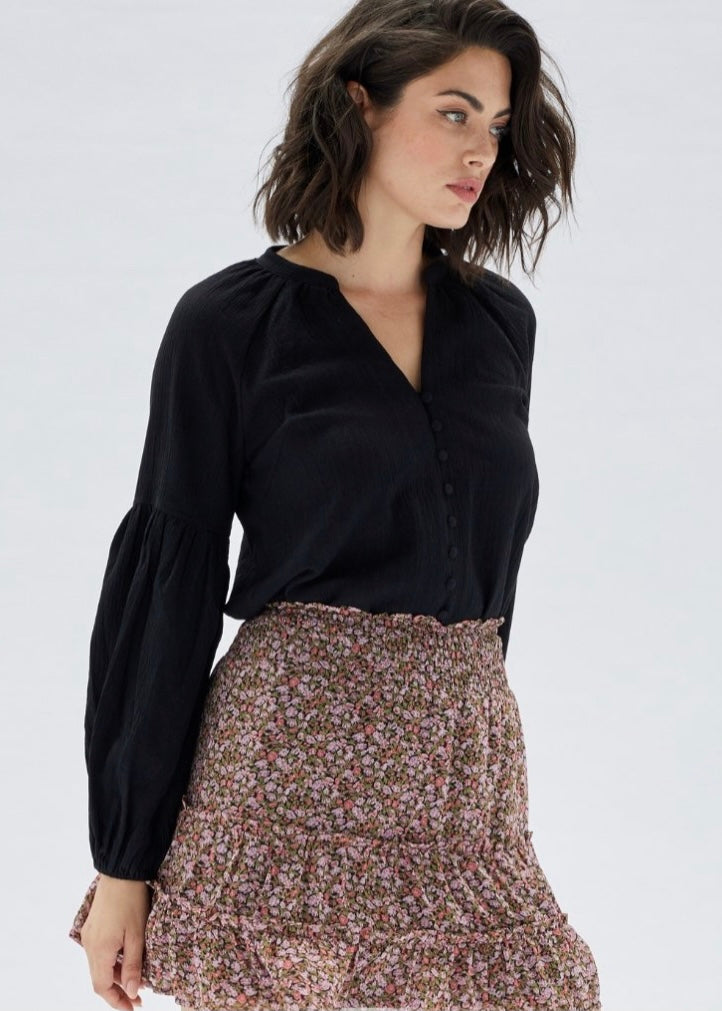 black peasant style top with a v neckline, button down front and bubble sleeve by MINK PINK