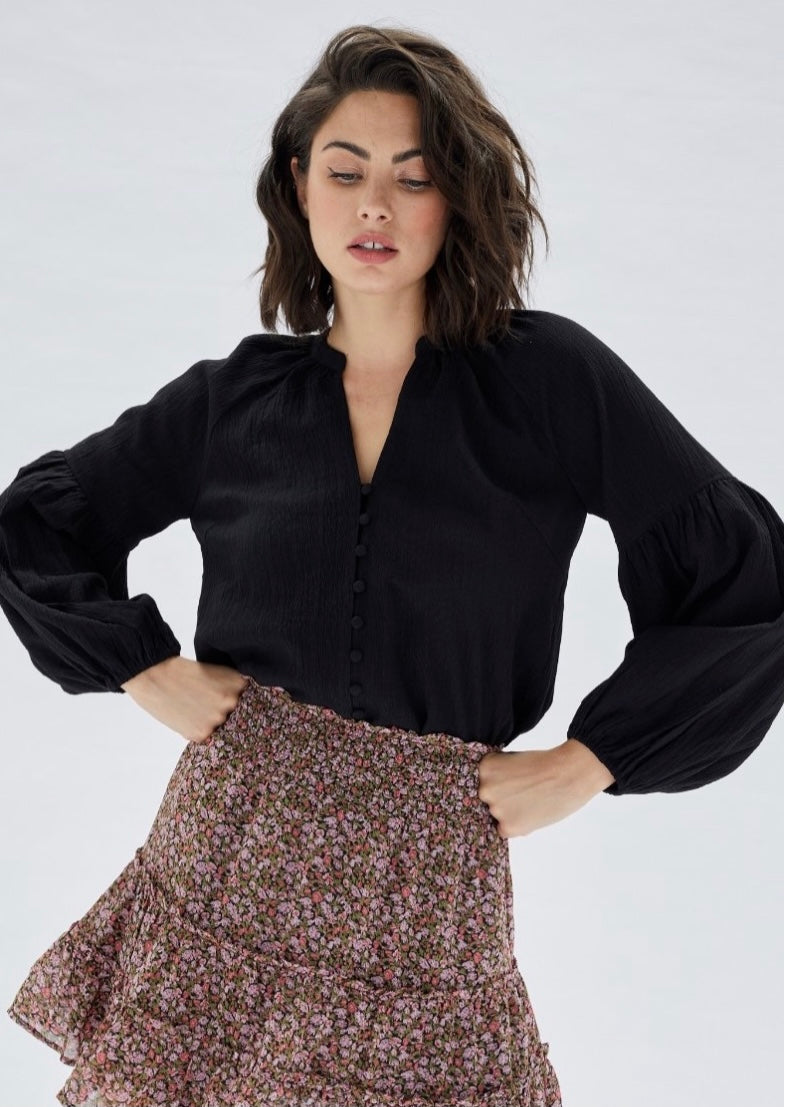 black peasant style top with a v neckline, button down front and bubble sleeve by MINK PINK